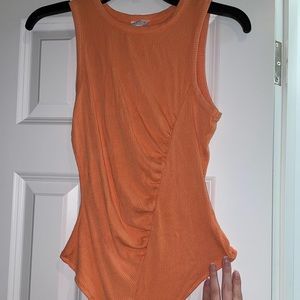 Orange bodysuit